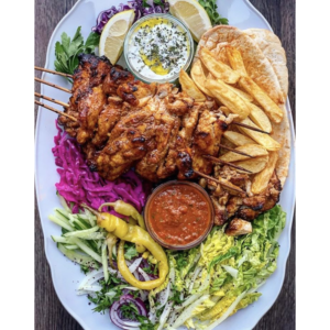 chicken kebab meat, chips and salad